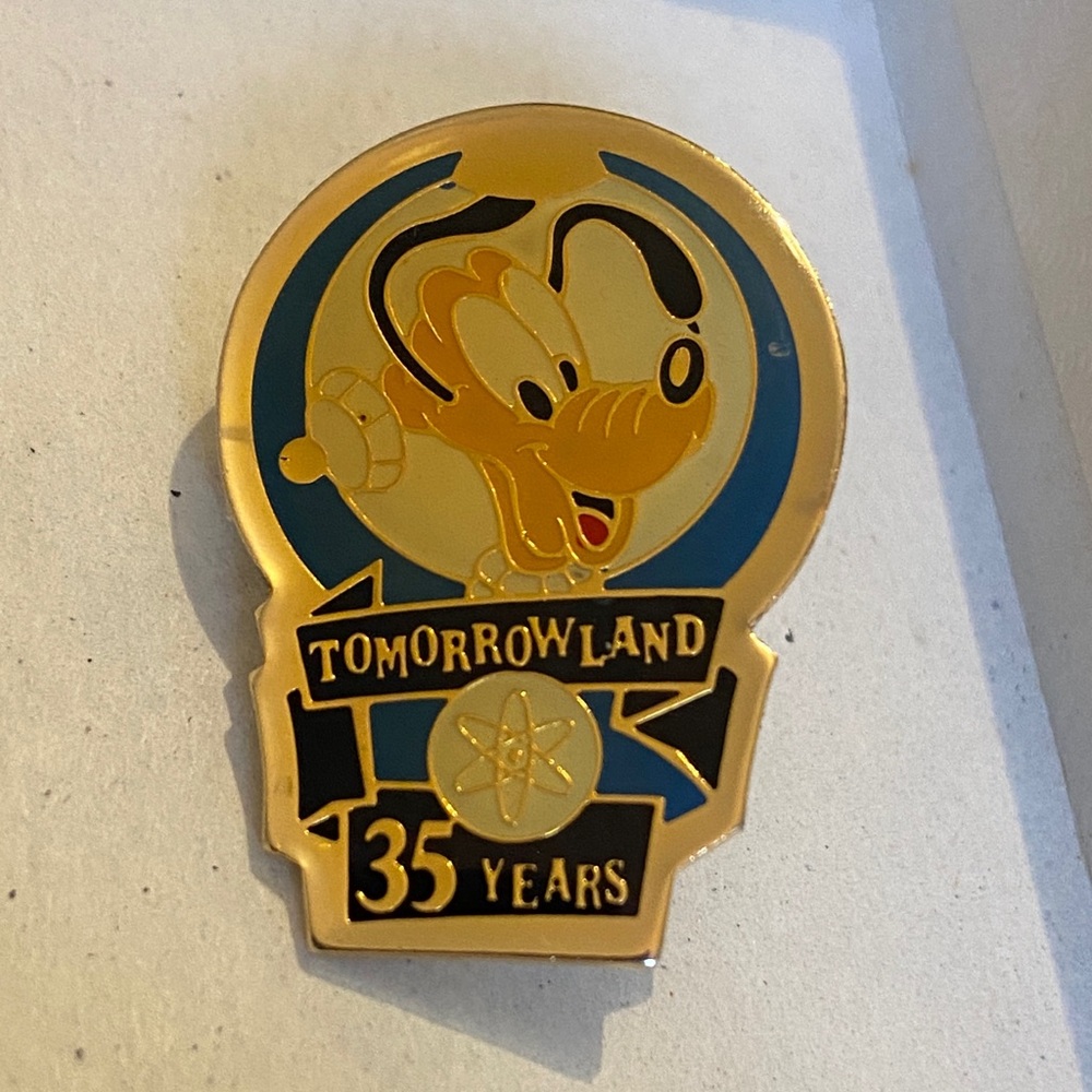 1990 Vintage authentic Disney “Tomorrowland” 35 years collectible pin with pluto